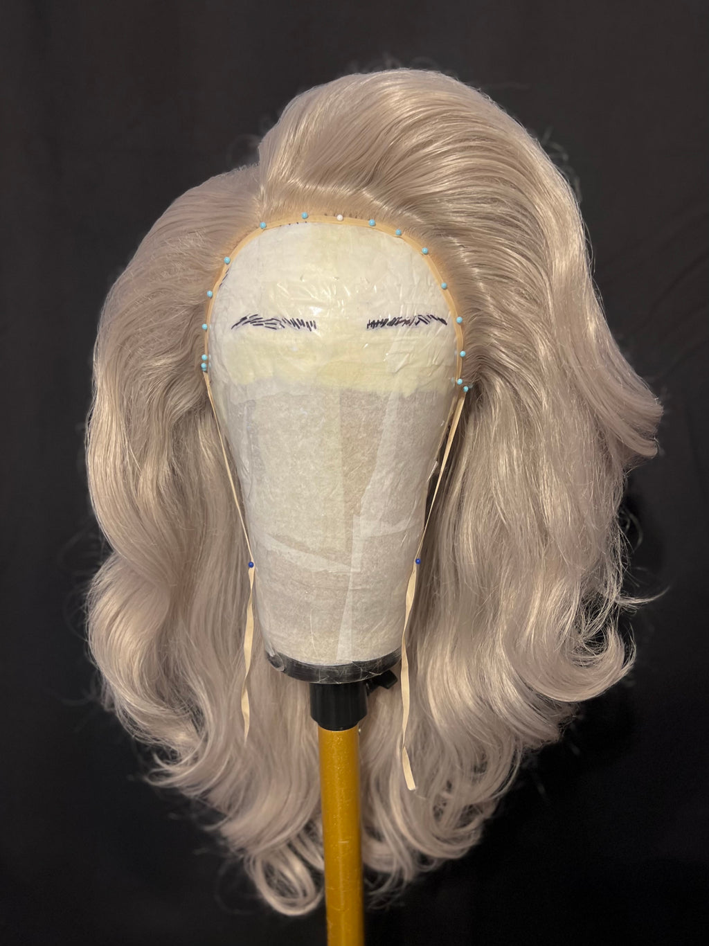 Grey teased wig styled by River Medway